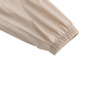 Chaqueta impermeable ligera de poliéster reciclado ecológico con bolsa autoempacable