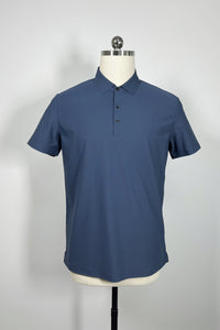 Polo unisex de piqué de alto rendimiento con costuras térmicas. Ideal para golf o ropa deportiva. M-01-007 Azul marino