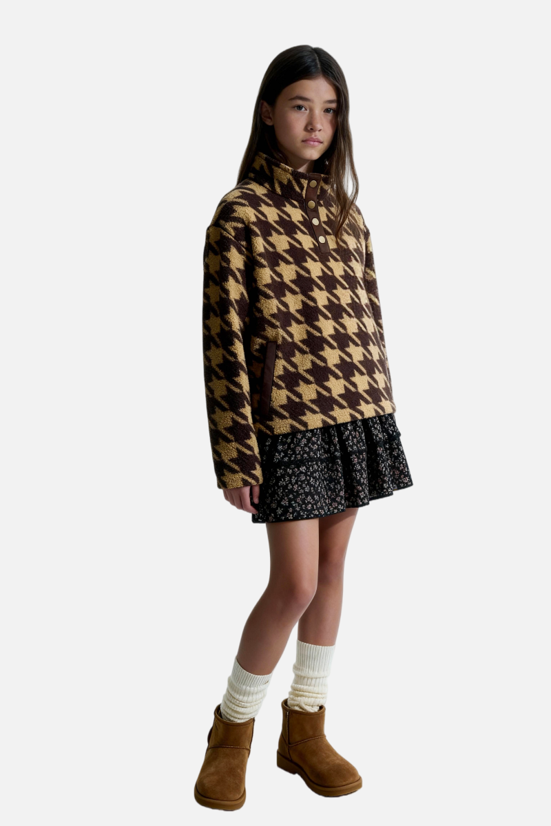 Comfortable daytime style, featuring a quarter-button design and fleece fabric, available in both boys' and girls' sizes
